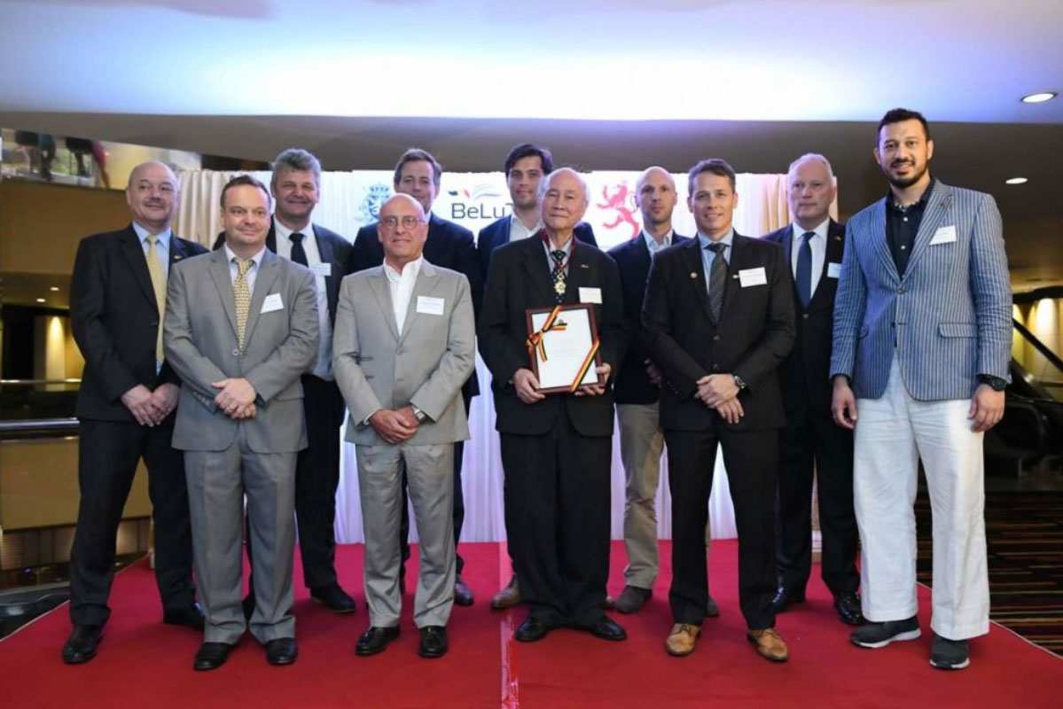 [vc_row][vc_column][vc_column_text]It is with our greatest pleasure to announce that one of our senior partners, the honorable Dr. Sutharm Valaisathien has been awarded with the Cross of Commander in the Order of the Crown (Commandeur de l’Ordre de la Couronne) by H.E. Ambassador Philippe Kridelka on behalf of His Majesty the King of the Belgians. The Order of the Crown is bestowed to Dr. Sutharm in recognition for his long year of diplomatic service. Moreover, Dr. Sutharm also resides as President of the Belgian-Luxembourg/Thai Chamber of Commerce where he had been holding the Presidency for the past decade (since 2001). After 10 years of Presidency, Dr Sutharm will become Honorary President of The Belgian-Luxembourg/Thai Chamber of Commerce. We, at ILCT are very proud of Dr Sutharm's effort in straightening the diplomatic relation between Belgium and Thailand.[/vc_column_text][/vc_column][/vc_row][vc_row css=".vc_custom_1638267971019{padding-top: 0px !important;padding-bottom: 0px !important;}"][vc_column width="1/3"][vc_single_image image="14702" img_size="full" alignment="center" onclick="link_image"][/vc_column][vc_column width="1/3"][vc_single_image image="14707" img_size="full" alignment="center" onclick="link_image"][/vc_column][vc_column width="1/3"][vc_single_image image="14709" img_size="full" alignment="center" onclick="link_image"][/vc_column][/vc_row][vc_row css=".vc_custom_1638268059954{padding-top: 0px !important;}"][vc_column css=".vc_custom_1638267693546{padding-top: 0px !important;}"][vc_single_image image="14711" img_size="full" alignment="center" onclick="link_image"][/vc_column][/vc_row]